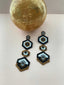 Pendientes de flores de mal de ojo