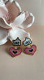 Pendientes de signo de amor